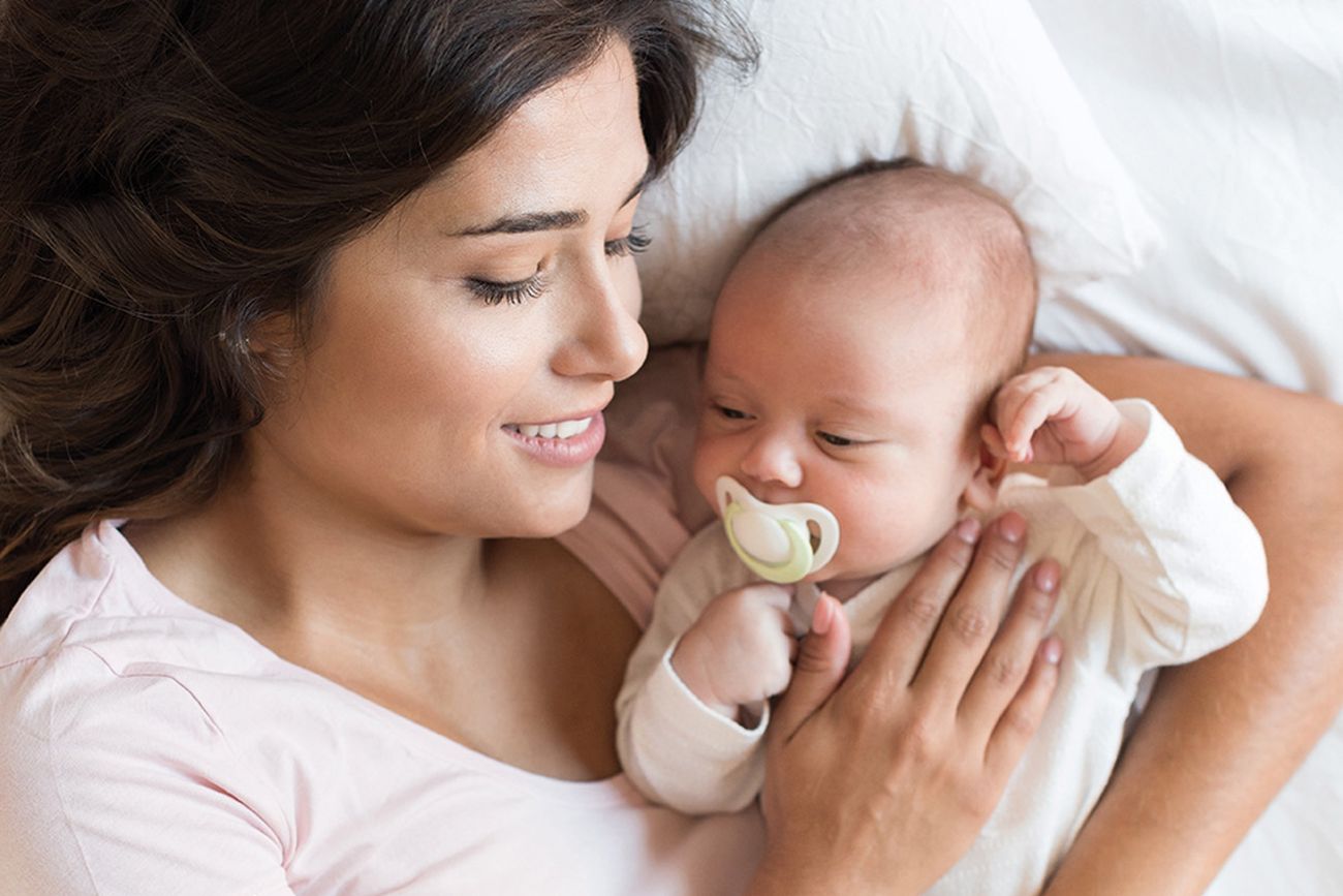 Foto zeigt Mutter mit Baby